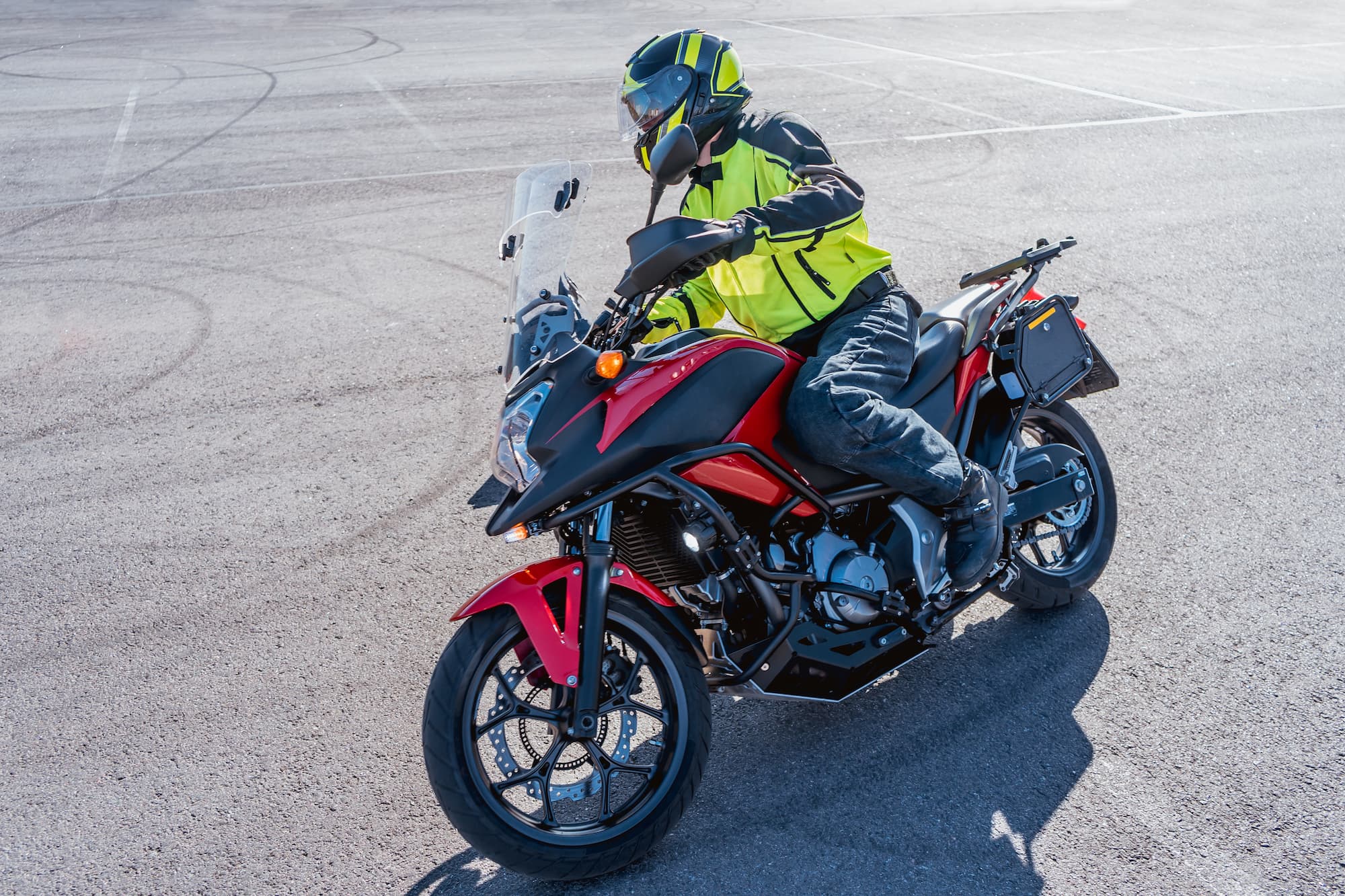 TEAM Arizona motorcycle rider learning how to turn on a motorcycle during a training course.